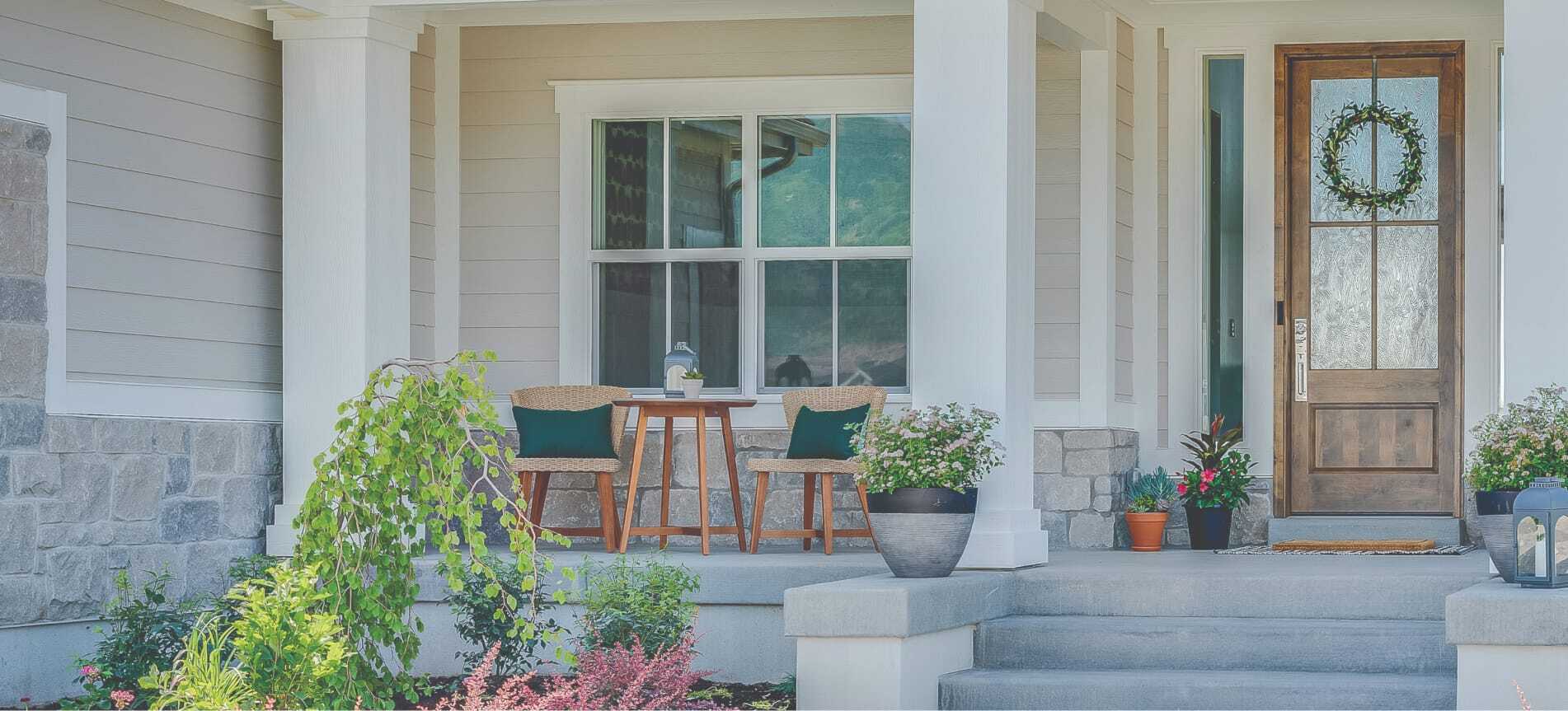 A cozy front porch with rocking chairs